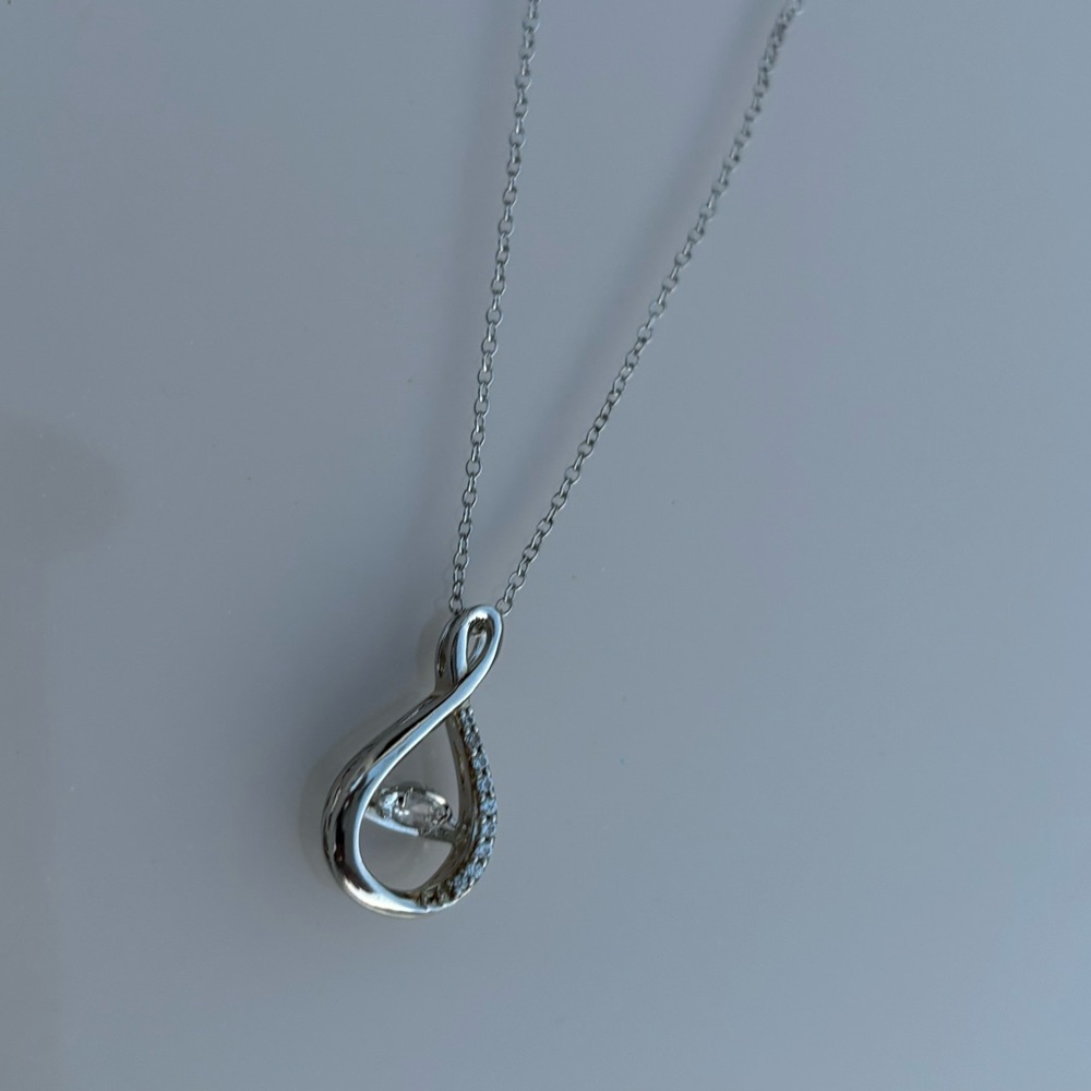 Sterling Silver dancing twist pendant